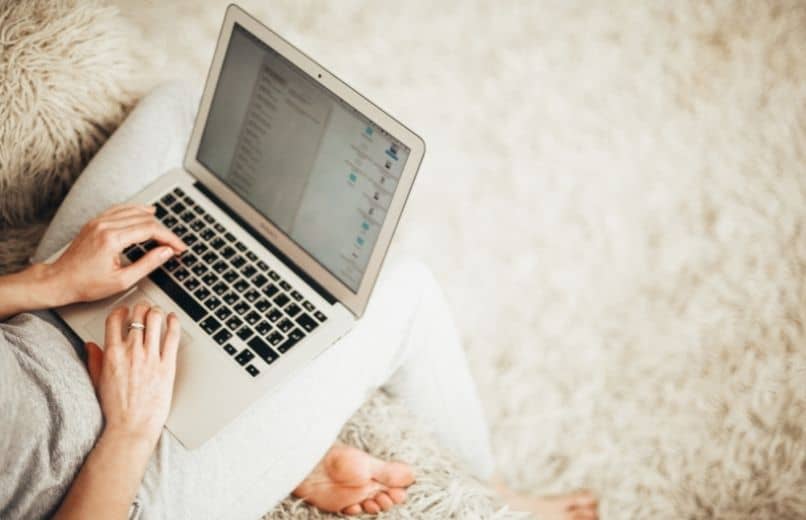 woman typing on computer