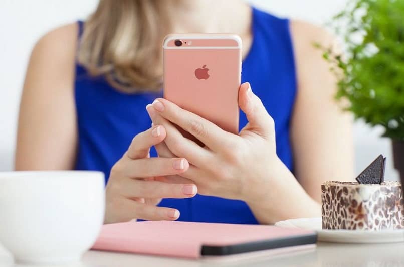 woman holding iphone