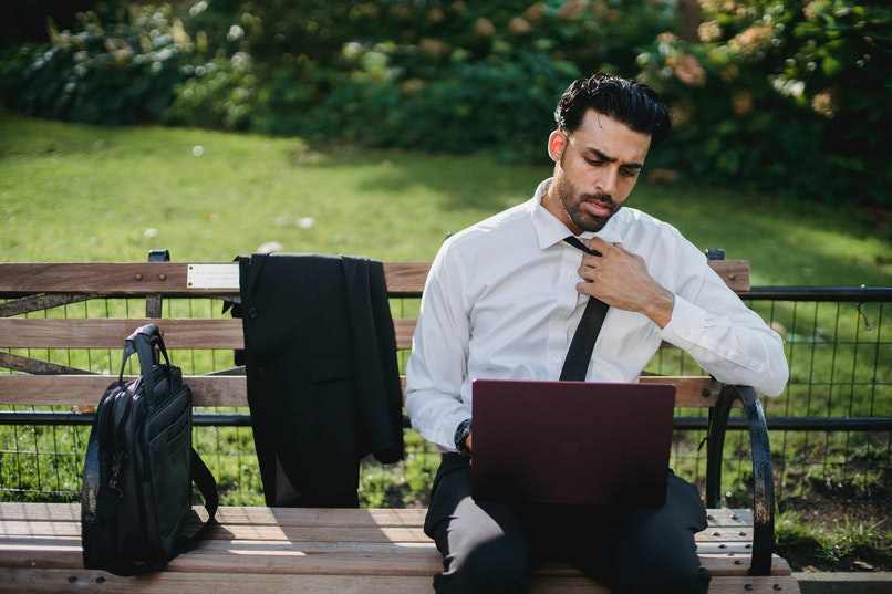 man doing something on his computer