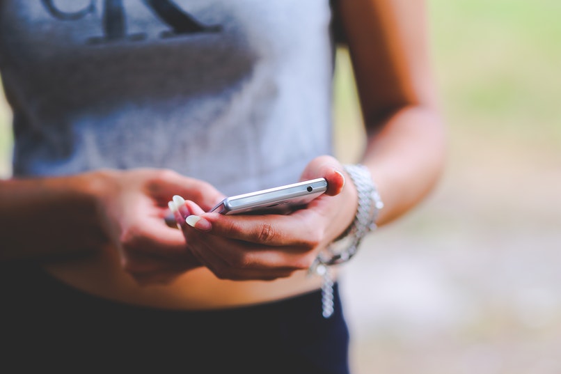 girl using mobile phone