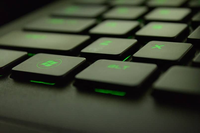 black keyboard with green