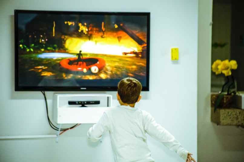 boy playing video game