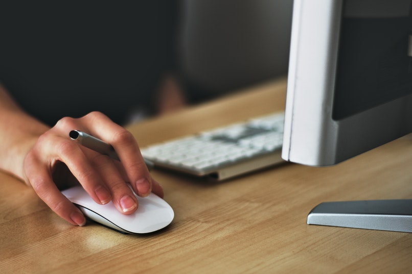 man researching something on computer