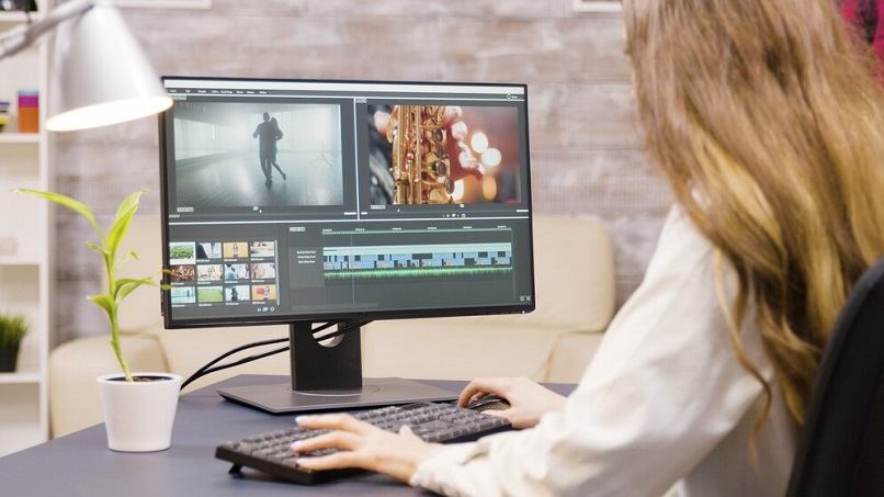 sitting woman editing video