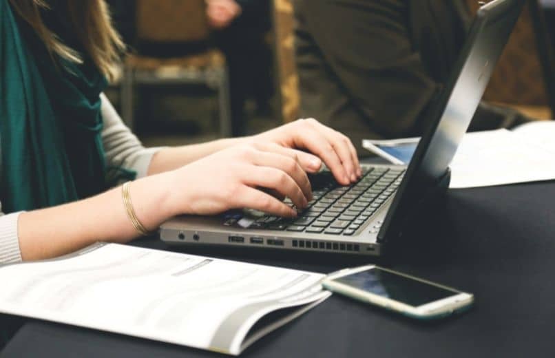 woman using laptop