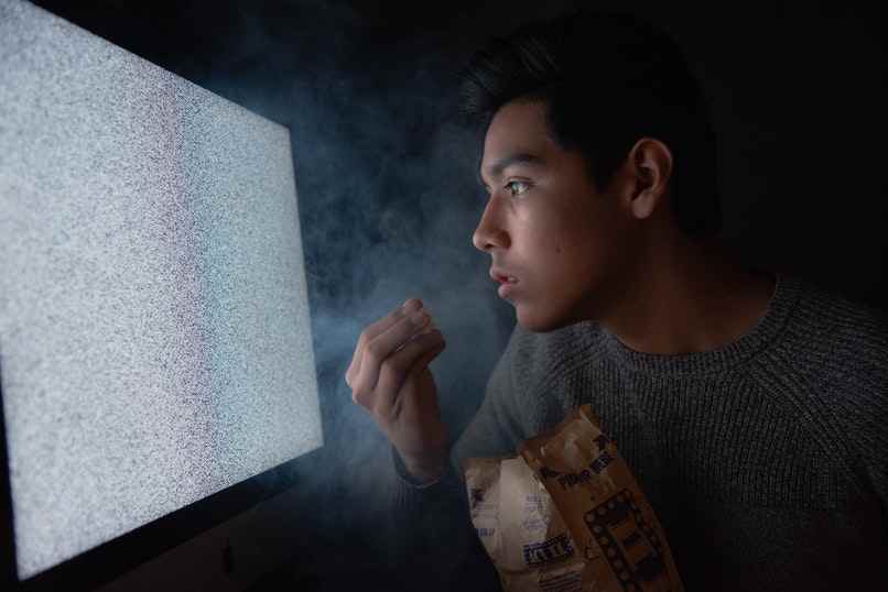 boy watching tv no signal