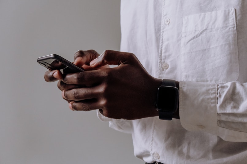 boy doing something on the phone